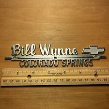Vintage Bill Wynne Chevy Colorado Springs Auto Dealership Emblem Car Badge Metal