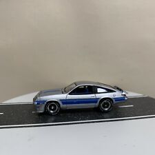 Johnny Lightning Classic Gold 1980 Chevy Monza Spyder Silverblue Stripes 164